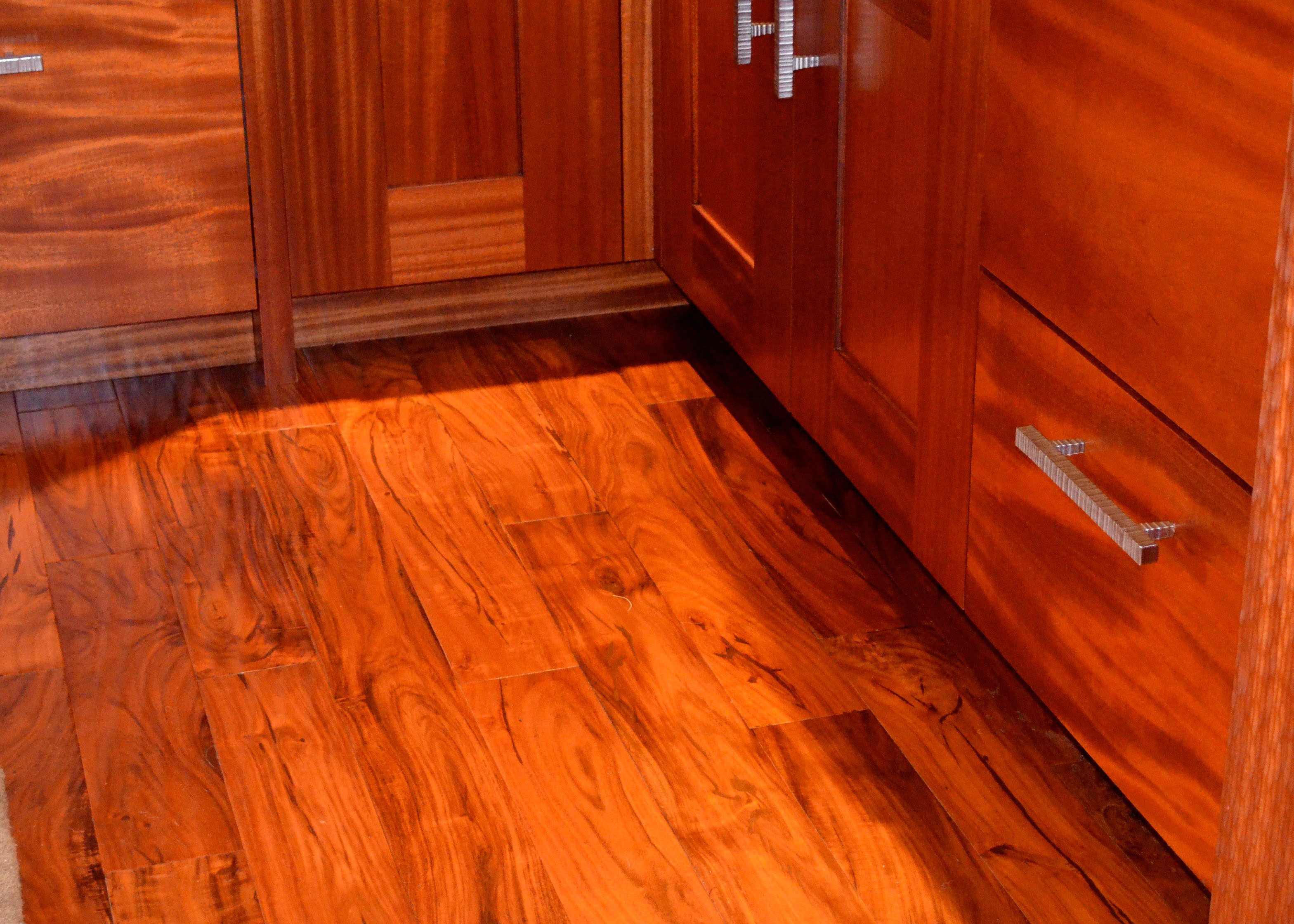 Hardwood flooring compliments cabinets in Makena Maui